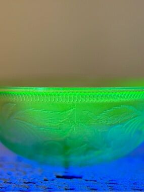 Green uranium glass bowl with cherry pattern